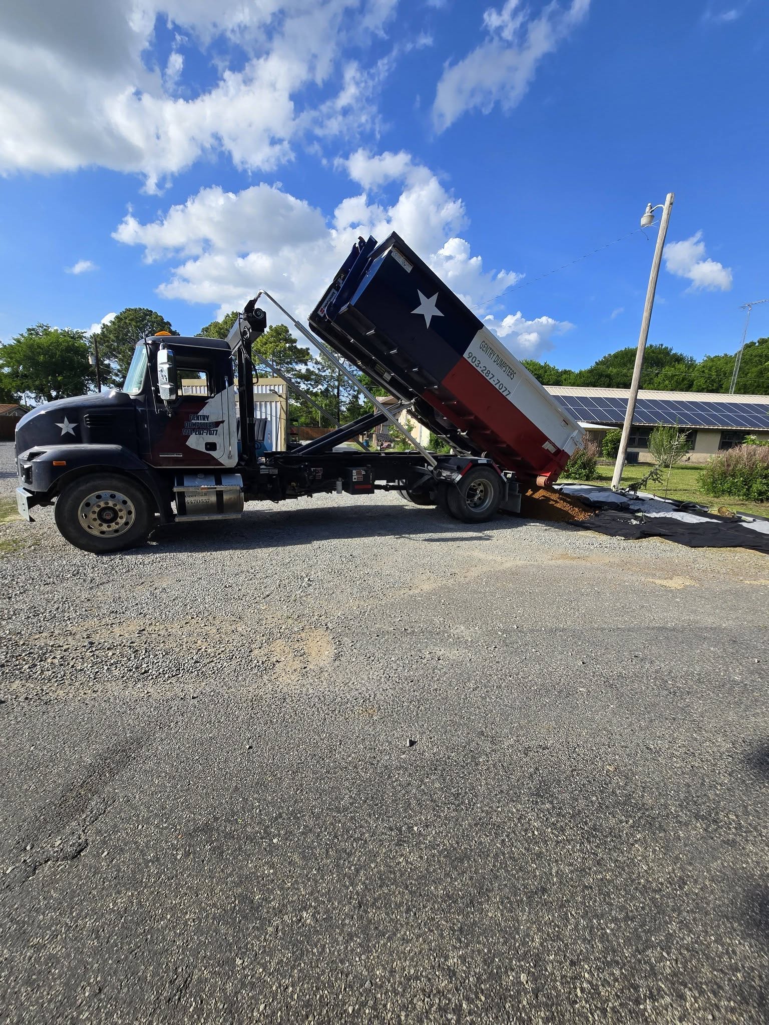 Gentry Dumpster Rentals dumpster delivered on a job in Grayson County, TX