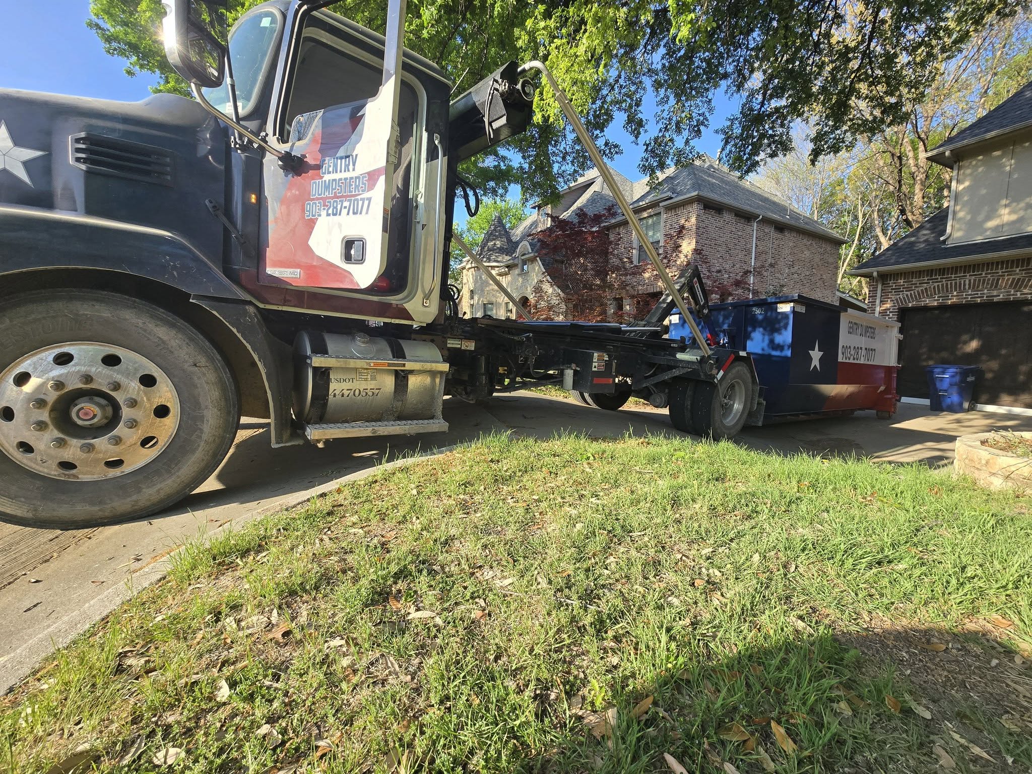 Gentry Dumpster Rentals dumpster on a home and garage cleanouts job in Whitesboro
