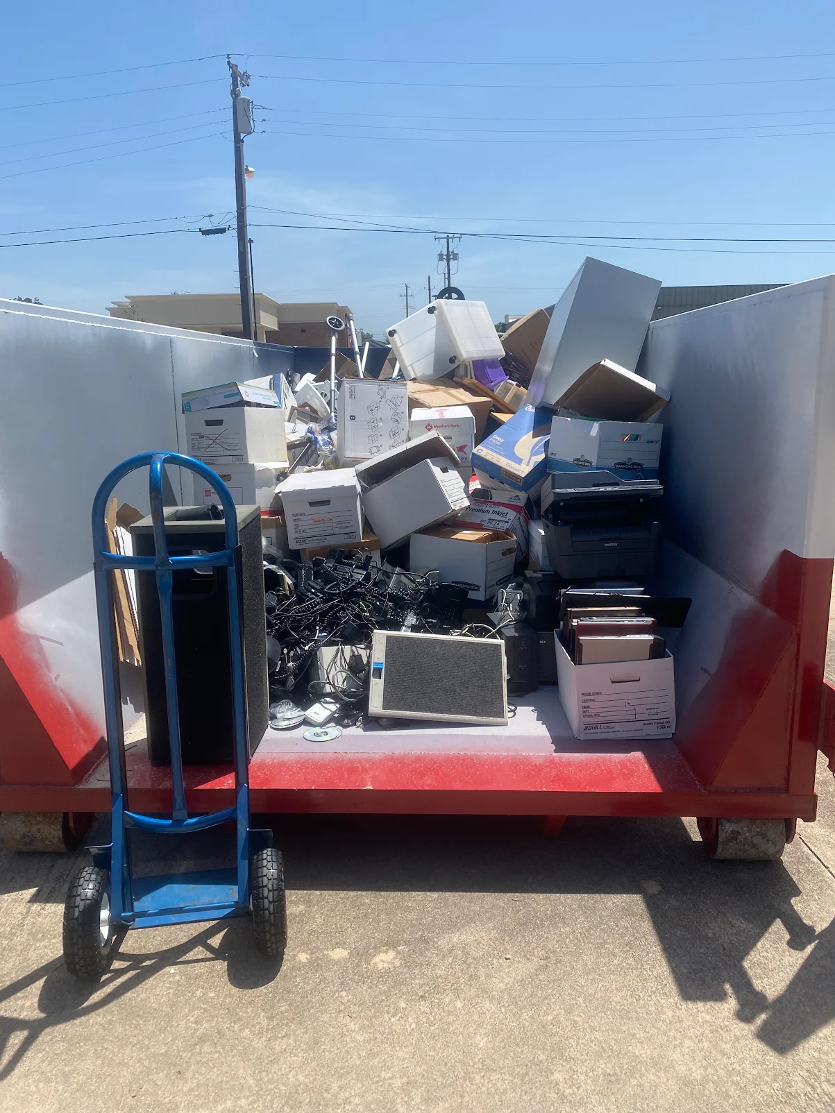 Gentry Dumpster Rentals dumpster on a home and garage cleanouts job in McKinney