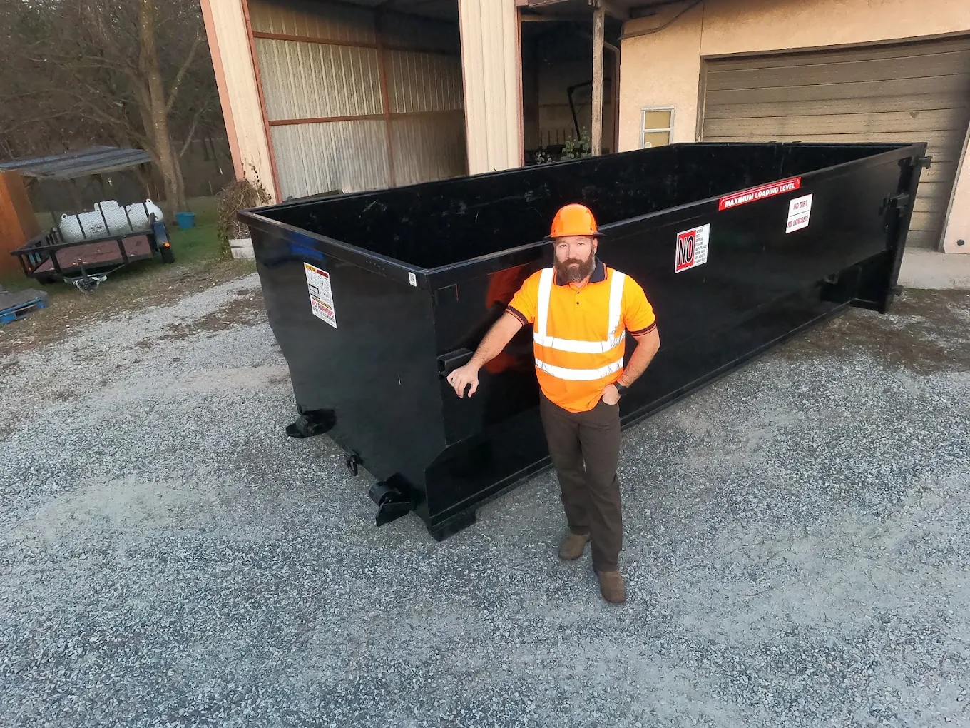 Gentry Dumpster Rentals dumpster delivered to a job site in North Texas
